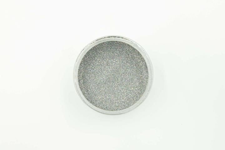 Health of Mind Art Gun Silver 50g Metallic Glitter Powder detail shot showcasing its secondary rainbow finish