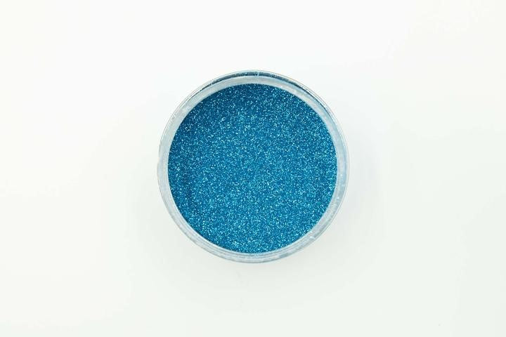 Electric Blue 50g Metallic Glitter Powder for Epoxy Resin bottle with vibrant metallic finish and rainbow effect