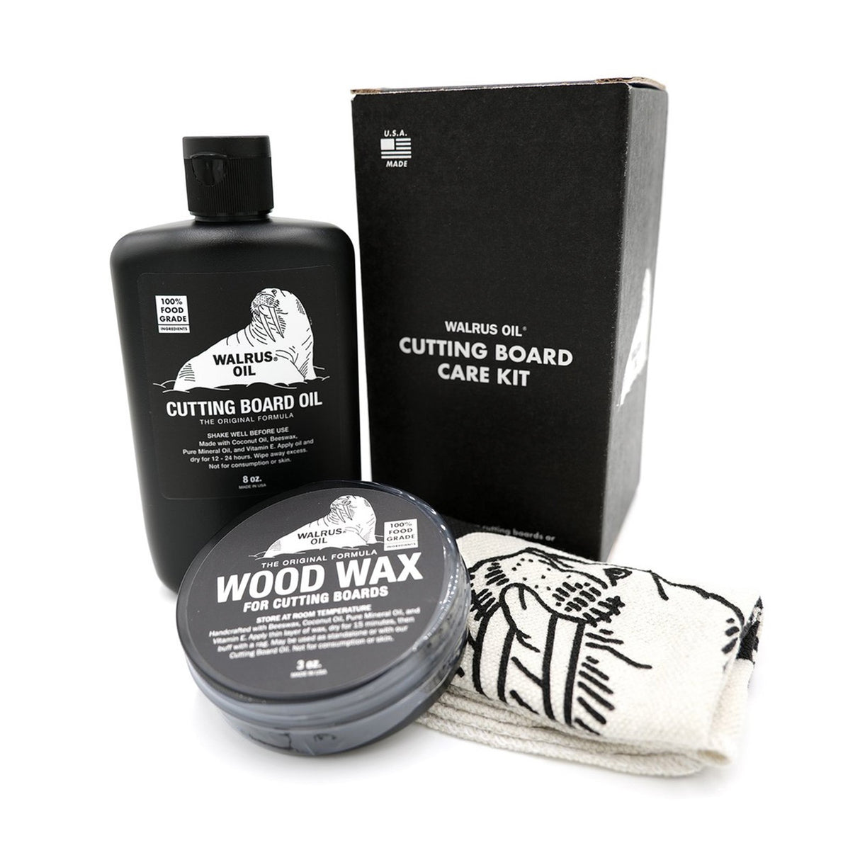 Walrus Oil Cutting Board Care Kit with buffing rag and maintenance products in collectible box