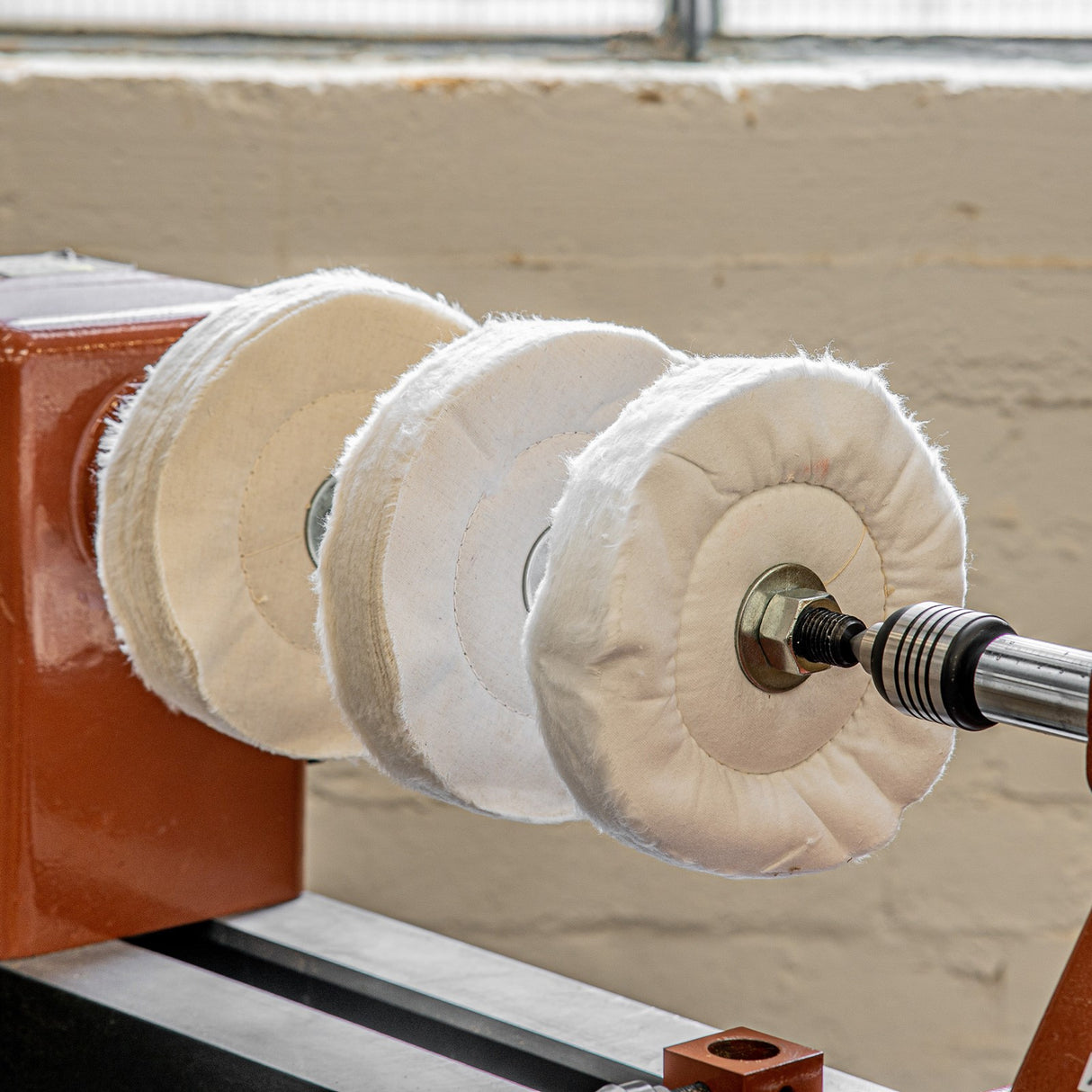 Torquata Triple Step Lathe Buffing Spindle, angled view, showcasing the unique design for achieving a durable wax finish on woodturning projects