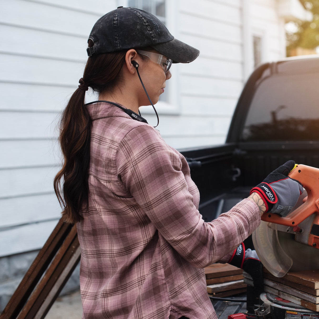 ISOtunes XTRA 2.0 Black Bluetooth Noise-Isolating Earbuds in woodworking environment