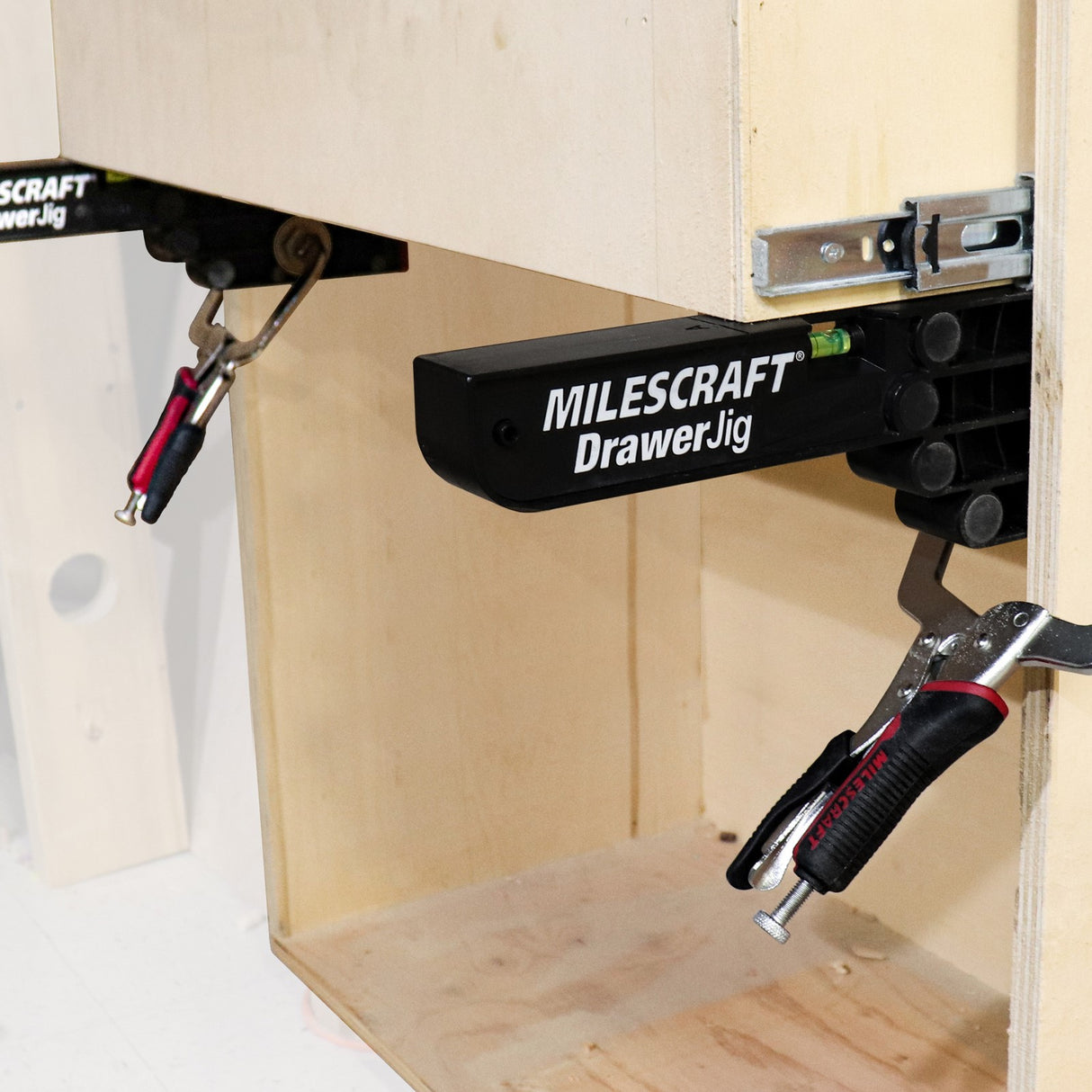 Milescraft DrawerJig metal drawer runner installation jig in use