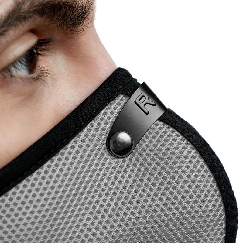 RZMask M2 Dust Face Mask in Titanium with Replaceable Filters, showing comfortable fit and breathable mesh design