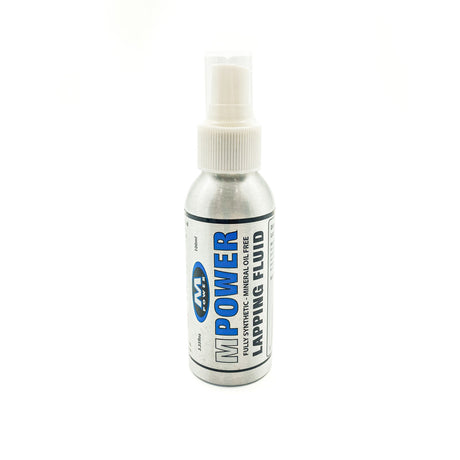 MPOWER Synthetic Lapping Fluid bottle with workshop equipment in background