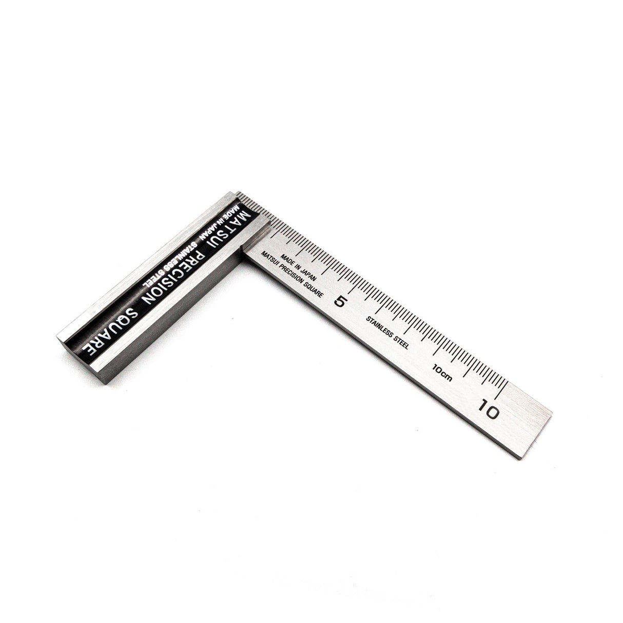 Matsui 100mm stainless steel precision square with metric and Kakume scales on wooden workbench