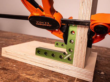 Torquata 100mm Corner Clamping Squares Aluminum Pack of 2 in use on wooden corner joint