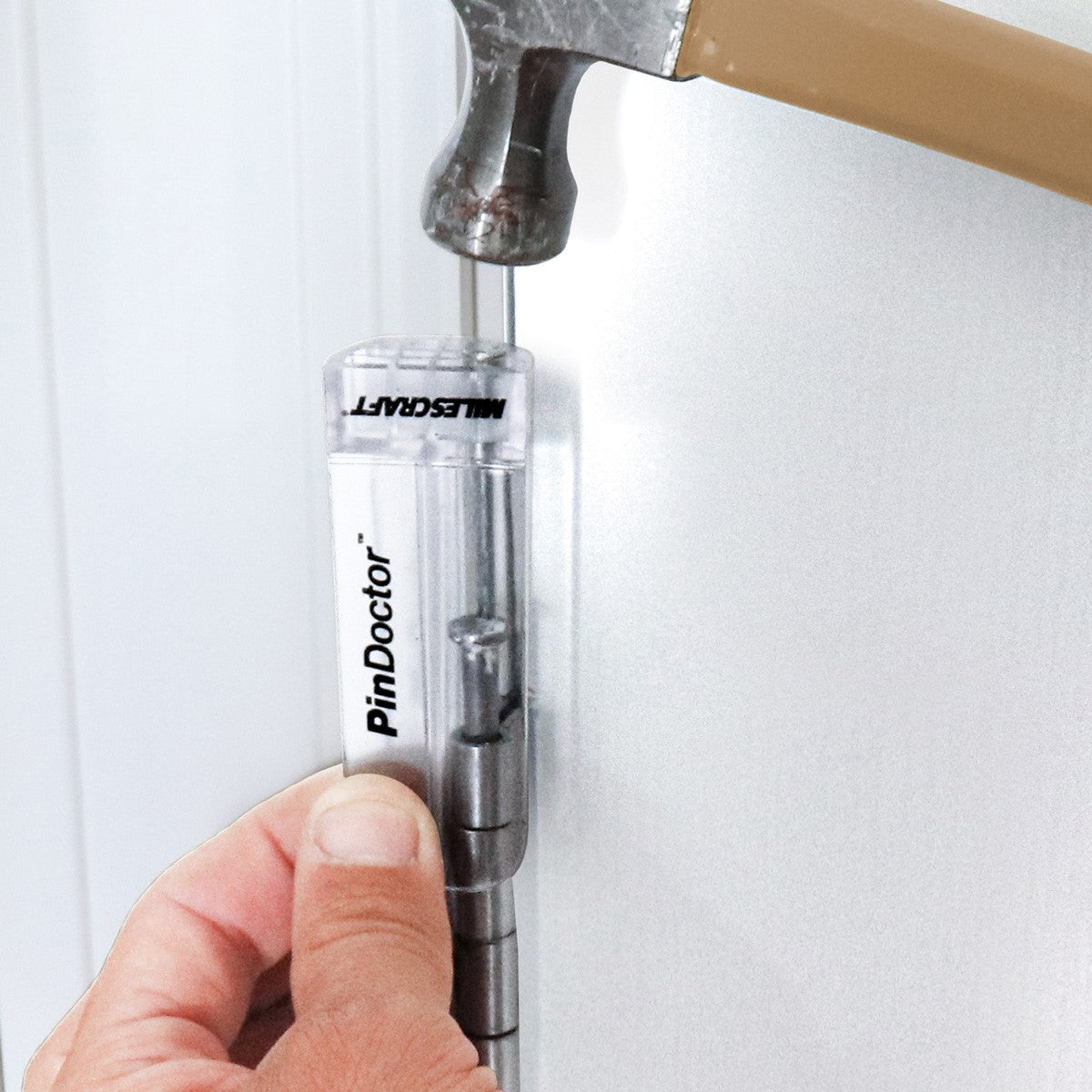 Milescraft HingeJigPLUS with PinDoctor & Router Bit for Door Hardware Installation in use on a wooden door frame