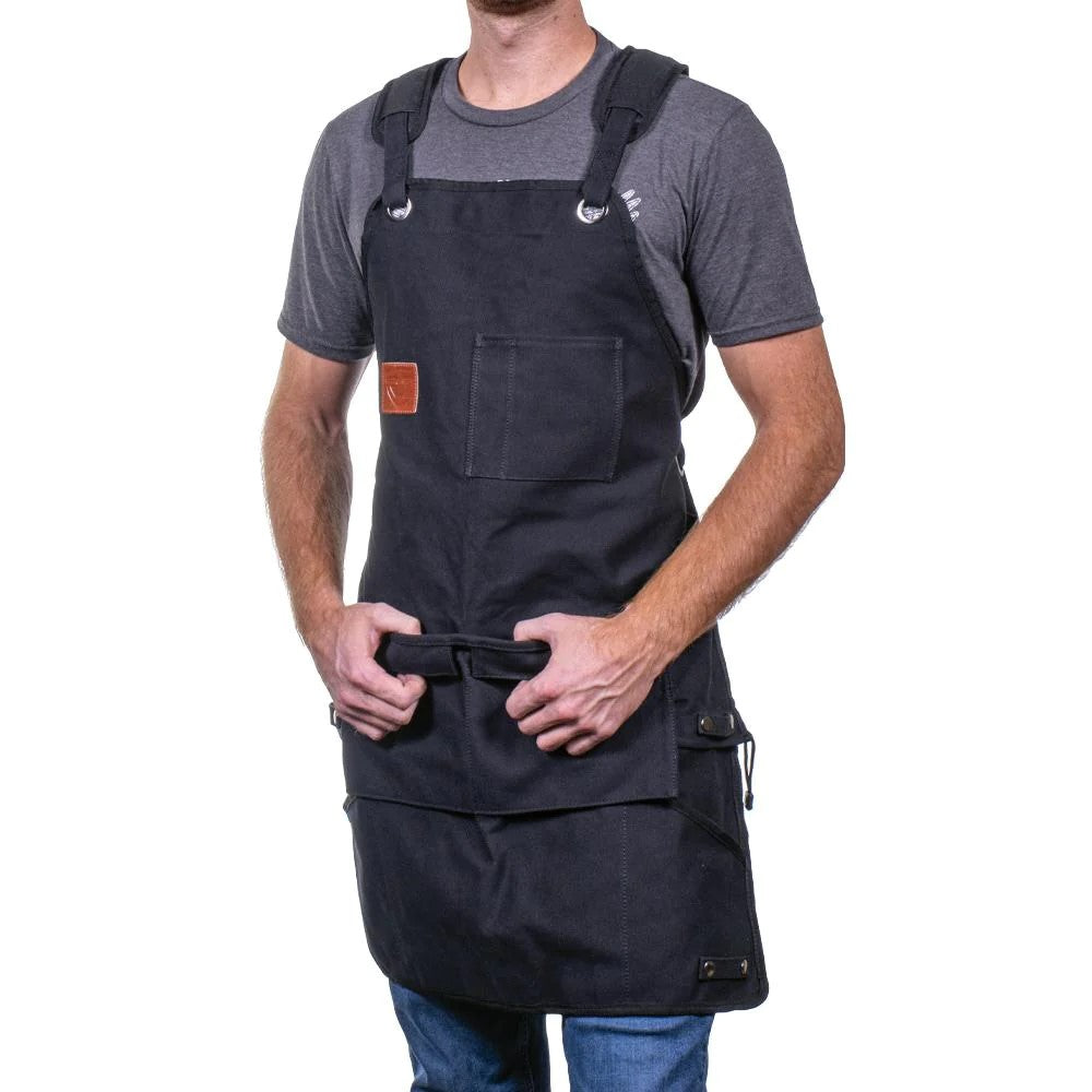 RZMask 3-in-1 Woodworkers Apron with Magnetised Pocket being worn as a full-length apron in a woodworking workshop