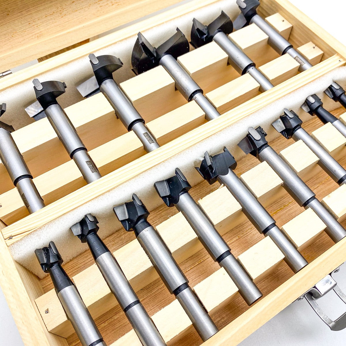 Torquata TCT Boring Bits Set of 15 Metric Forstner Bits in action drilling precise holes in Australian hardwood