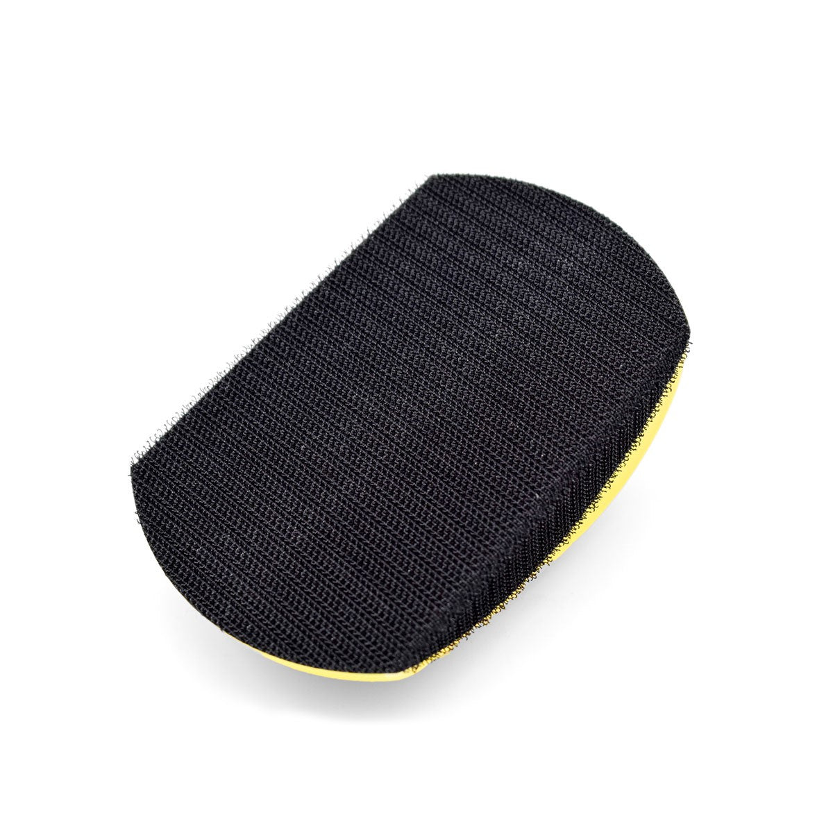 Flexible hand sanding pad with angled sides for sanding grooves and tight spots, suitable for woodworkers of all levels