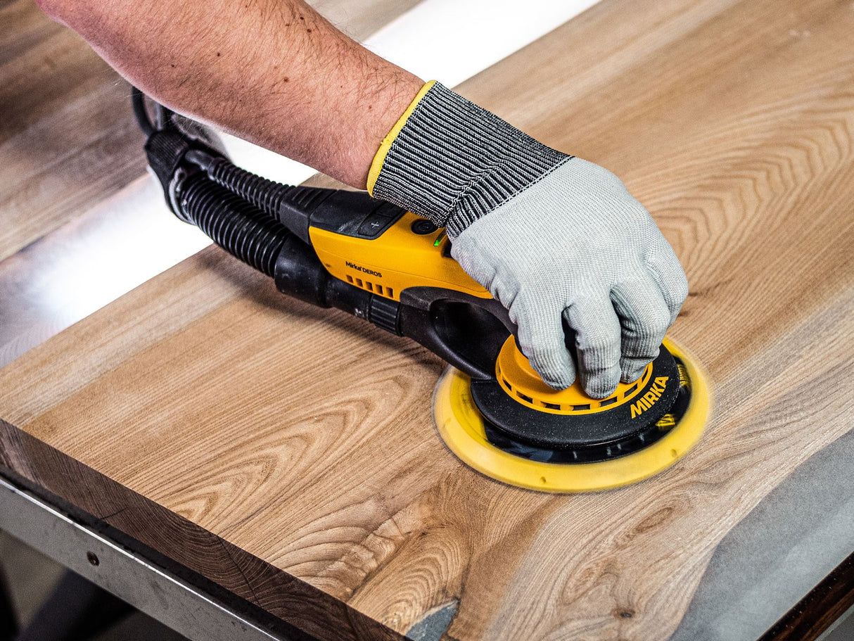 Mirka DEROS 150mm Orbital Sander showcasing sleek design and powerful sanding capabilities