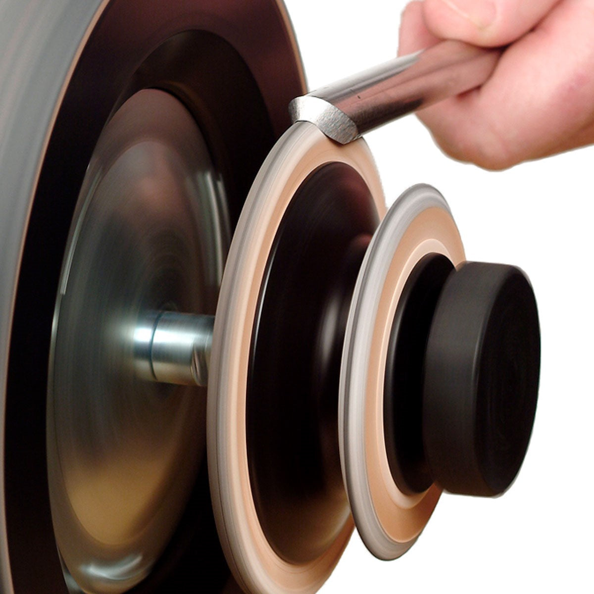 Tormek Wetstone Grinder Leather Honing Wheel in action on woodworking tool