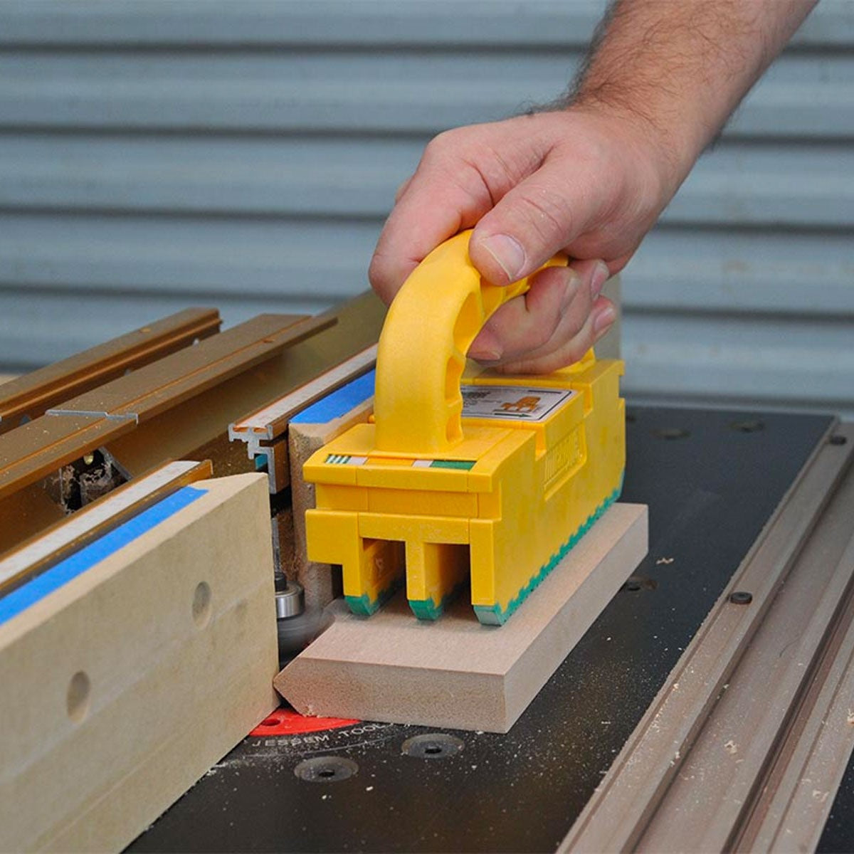 MicroJig GRR-Ripper 2GO in use on table saw, enhancing safety and precision for woodworkers
