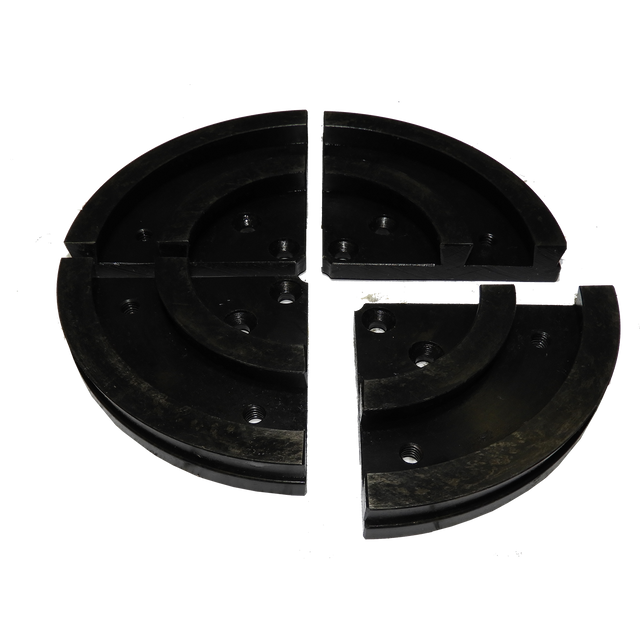 Vicmarc Multipurpose Jaws for VM90/100 Chuck on wood lathe, with segments removed for versatile use. Uni-Chuck adaptability shown