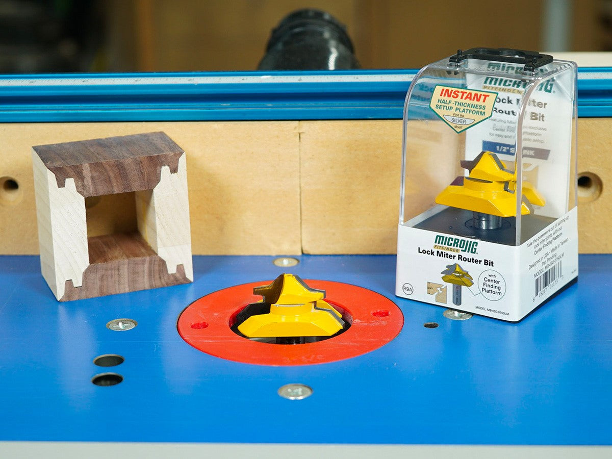 Micro Jig Lock Mitre Bit and FitFinder Jig Kit in use on a router table, showcasing precise lock mitre joint setup