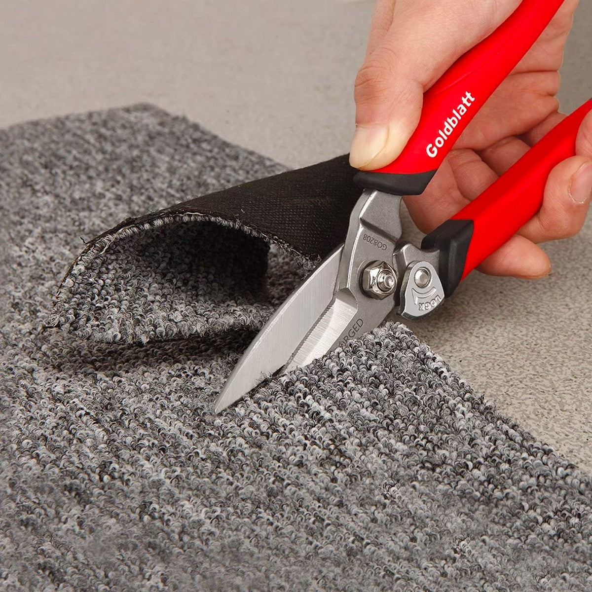 Goldblatt Heavy-Duty Utility Shear 200mm in action, showcasing its robust Cr-V steel construction and full-length blades