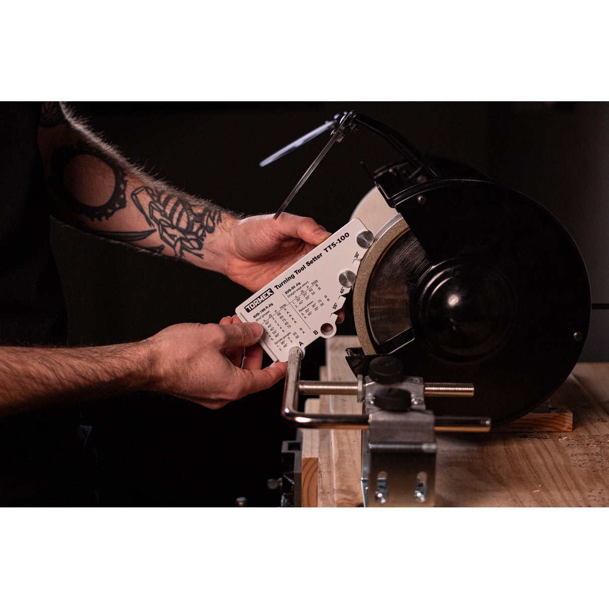 Tormek Bench Grinder Kit in action, demonstrating precision sharpening for woodworking tools