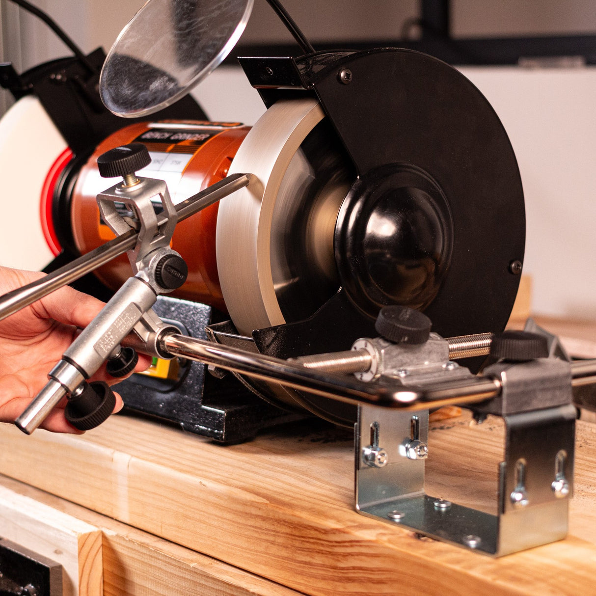 Tormek Bench Grinder Kit in use, showcasing precision sharpening process