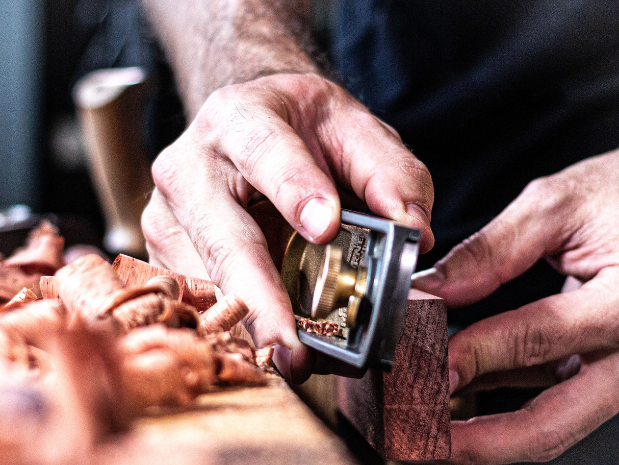 Melbourne Tool Company low angle block plane in use on wood board