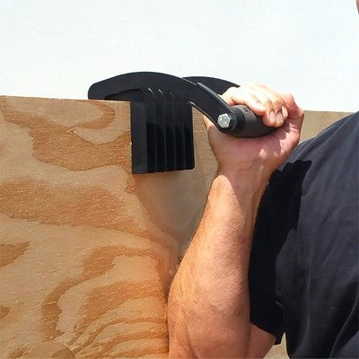 Goldblatt Gorilla Gripper XL carrying plywood sheet effortlessly