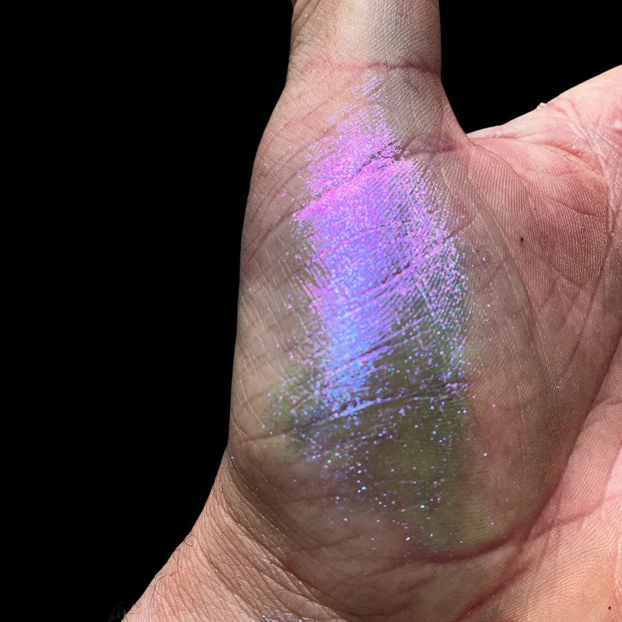 Vibrant violet, gold, blue, and purple Super Chameleon Mica Pigment for epoxy resin on timber surface