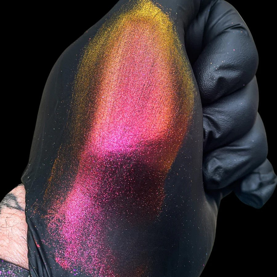 Vibrant red, gold, and orange Super Chameleon Mica Pigment for epoxy resin on timber edge