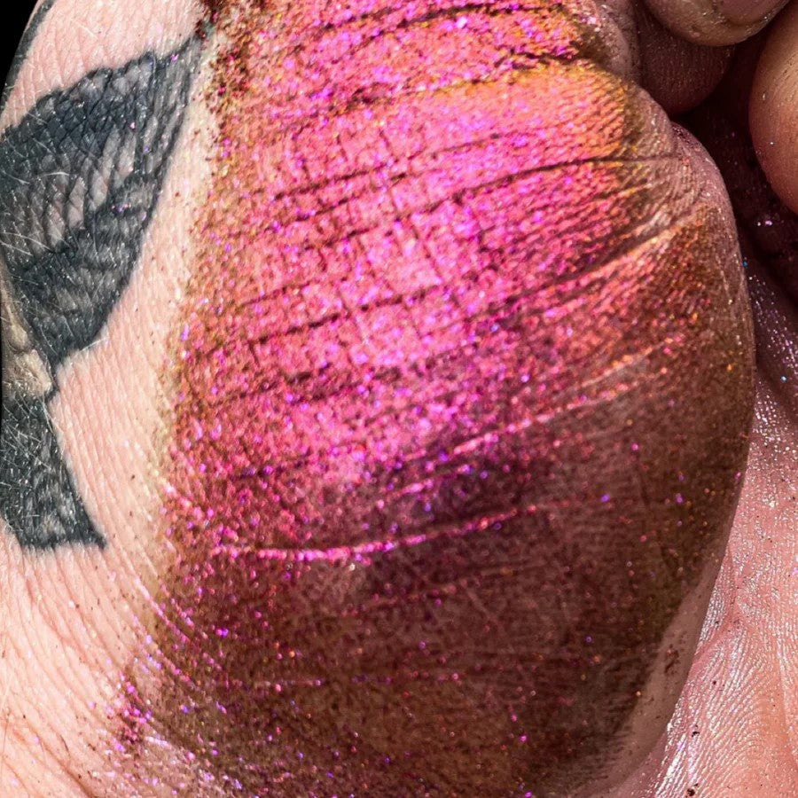 Vibrant red, gold, and orange Super Chameleon Mica Pigment for Epoxy Resin on timber edge