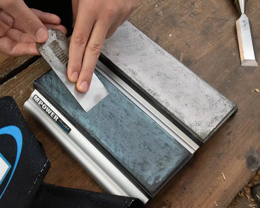 MPOWER SB2 double diamond sharpening stone set 600/1200 grit in use on a plane blade on a strop