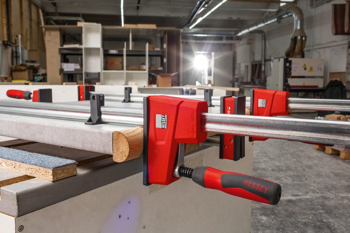 Bessey 1000mm K-Body Revo Parallel Clamps in action on wood panel