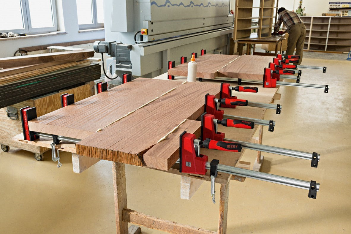 Bessey K-Body Revo Parallel Clamps 1250mm: Close-up view of jaw faces clamping round work piece