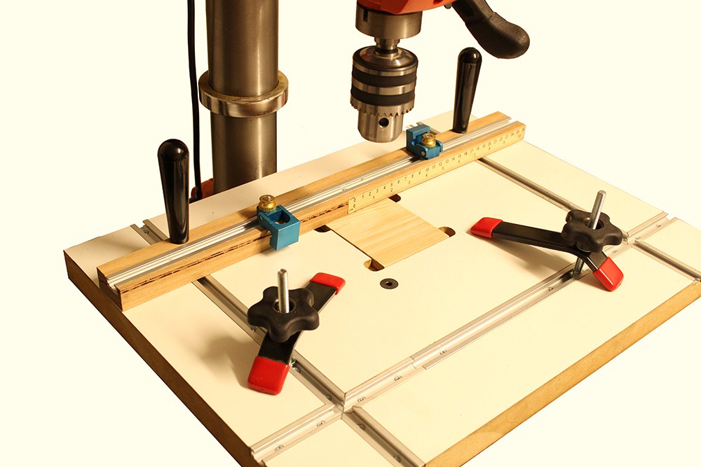 Australian woodworking tools store Torquata Large Hold-Down Clamp for T-Track Workholding in use on a wooden workbench