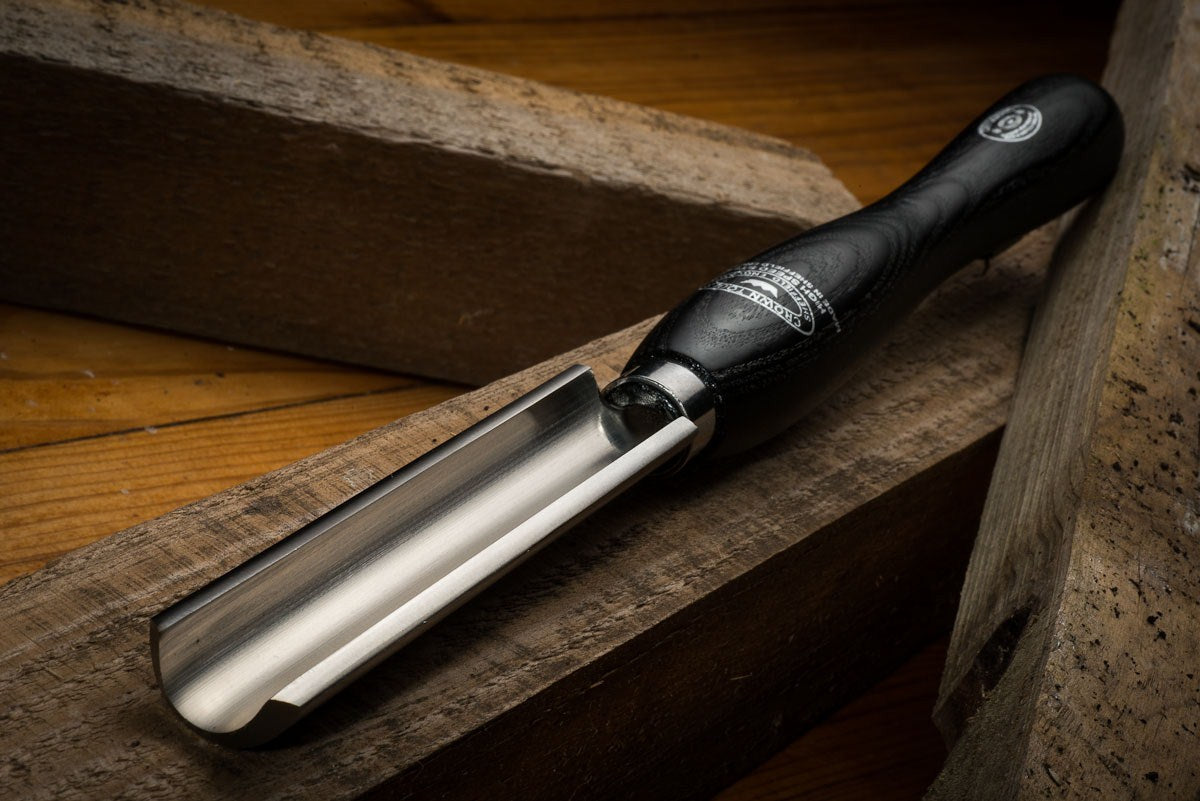 Crown 32mm Roughing Gouge M2 Cryogenic Steel Woodturning Tool in action, removing timber efficiently with steep 170-degree cutting edge