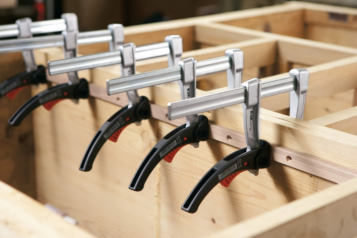 Bessey KliKlamp 300mm Ratcheting Clamp in action, showcasing its lightweight and durable design