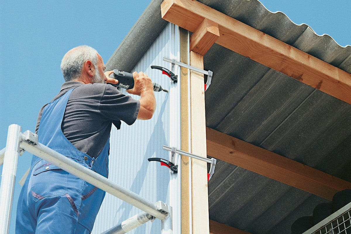 Bessey KliKlamp 300mm ratcheting clamp in action, demonstrating lightweight and durable construction