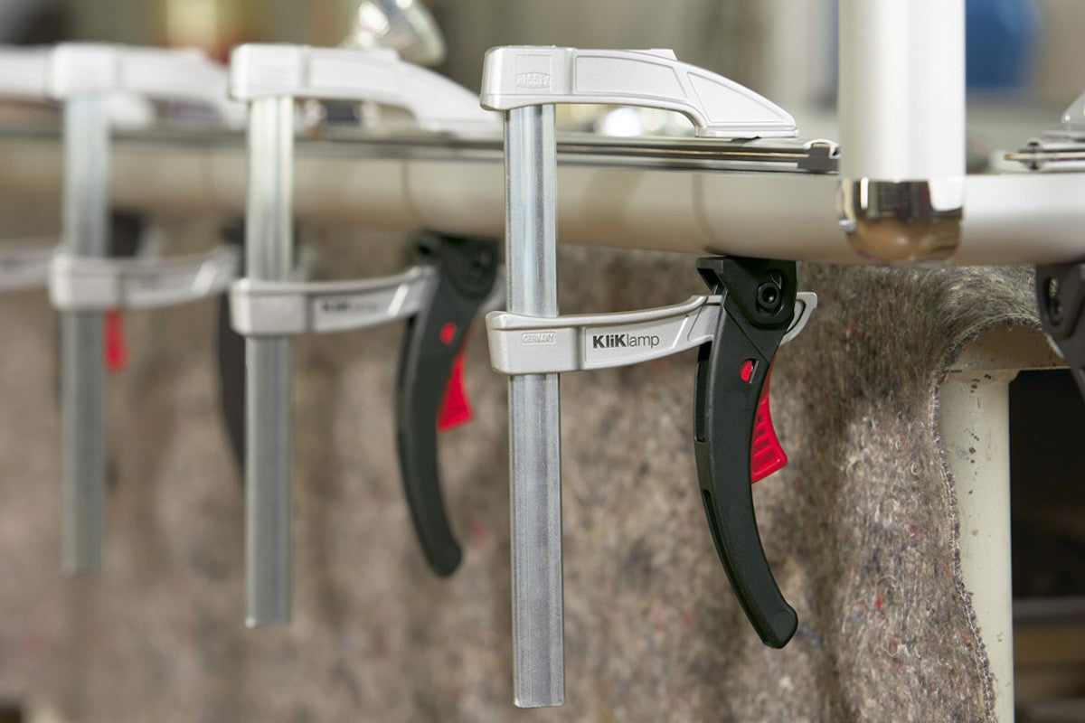 Bessey KliKlamp Ratcheting Clamp 160mm Capacity in action, showcasing its lightweight design and sturdy construction