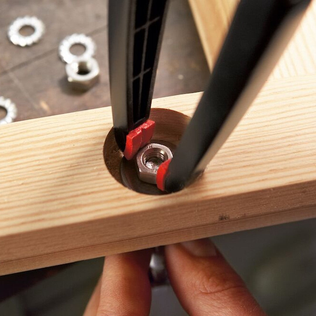 Bessey Needle Nose Spring Clamp in use, showing narrow jaws and one-handed operation