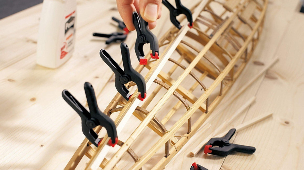 Bessey Clippix Spring Clamp 60mm Opening x 50mm Throat being held showing easy one-handed clamping action