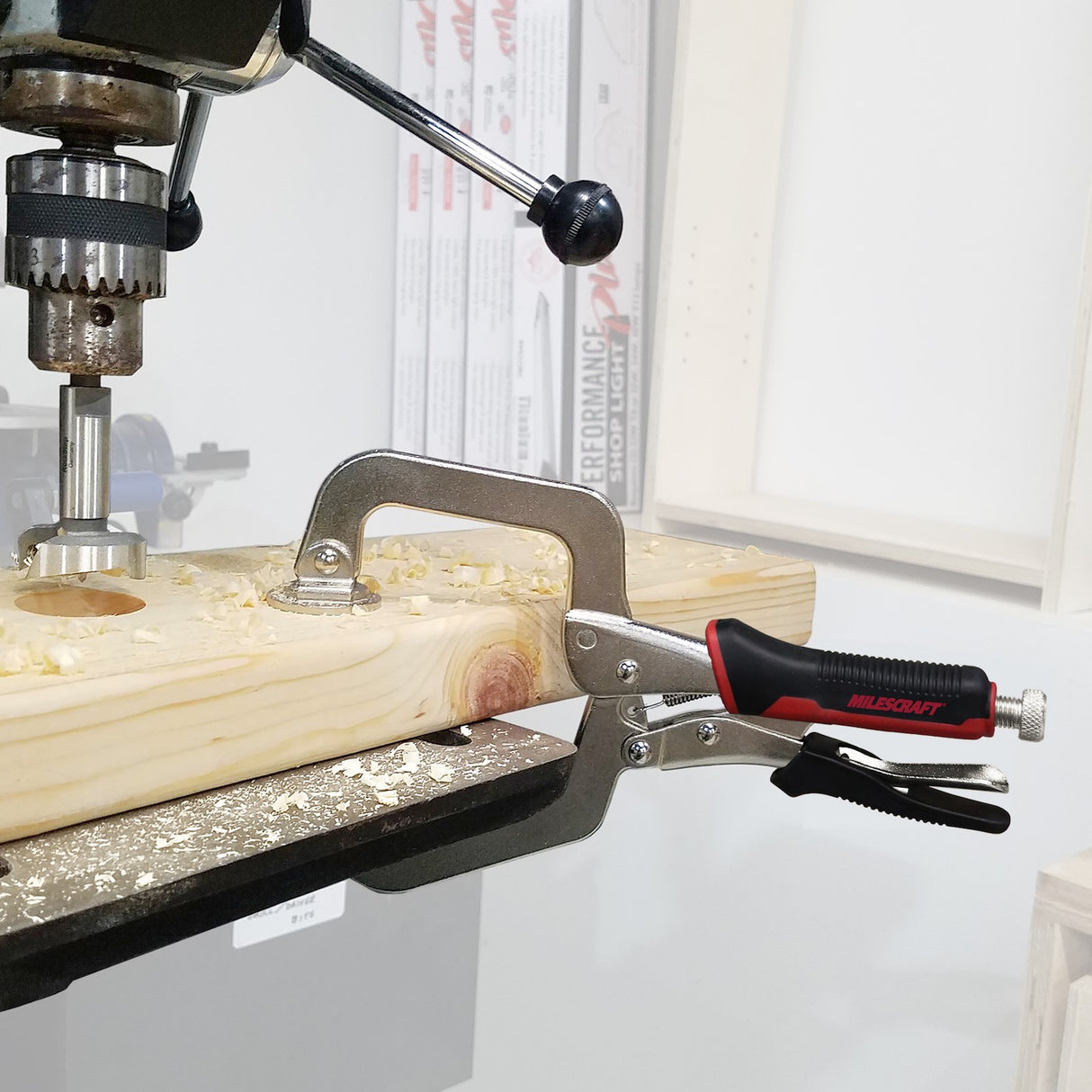 Milescraft 3in FaceClamp Framing Clamp in use, showing metal swivel pads for flush joint creation