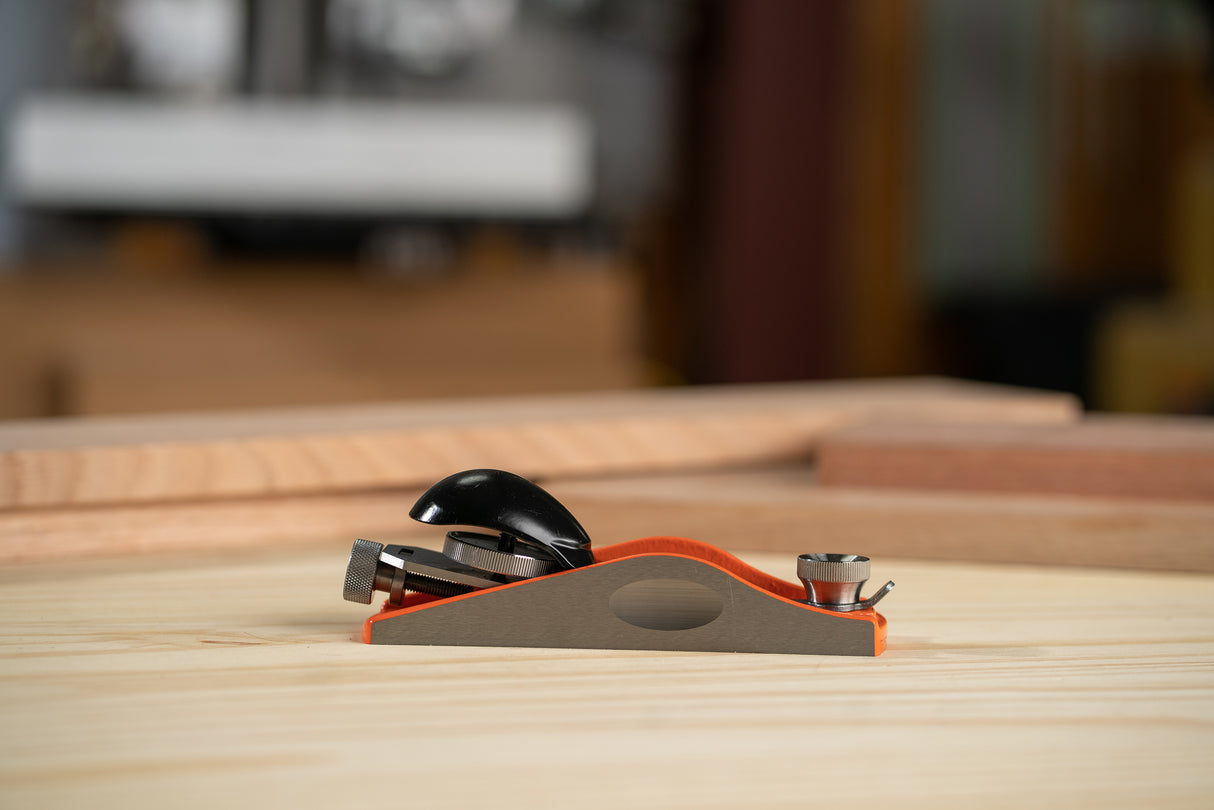 Pony Jorgensen Low-Angle Block Plane in action on timber, showcasing precision woodworking craftsmanship
