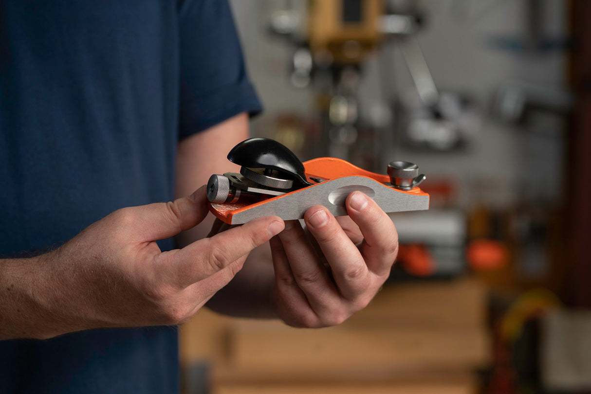 Pony Jorgensen Low-Angle Block Hand Plane trimming wood at an angle