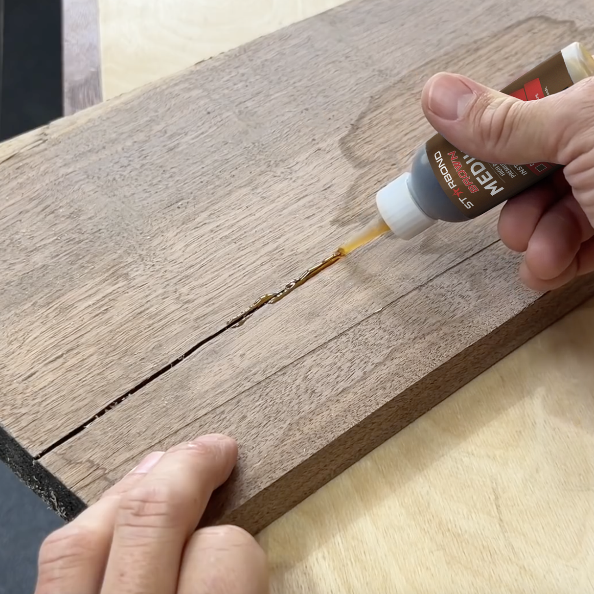 Starbond Brown Medium CA Super Glue 2oz tube with amber-tinted adhesive for woodworking projects