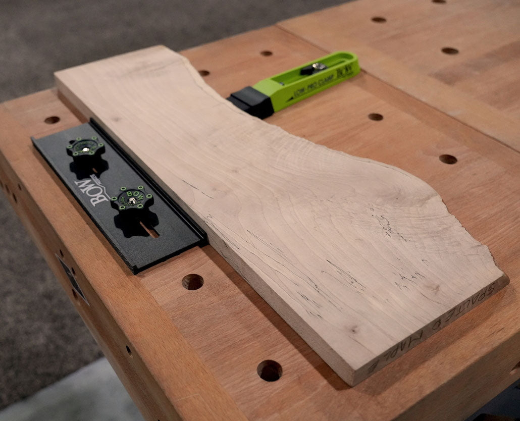 Low angle view of BOW Products Low Profile Clamping Kit attached to a workholding platform