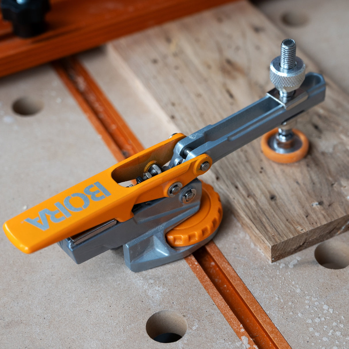 BORA Tool Auto Adjust T-Track Standard Toggle Clamp in use for woodworking project
