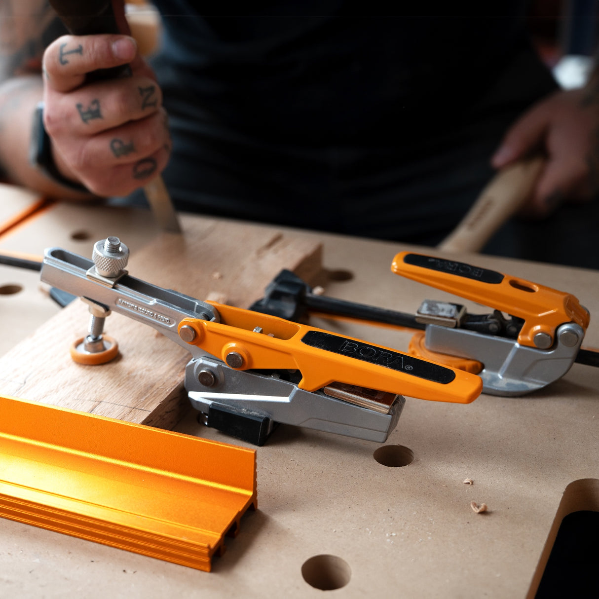 Toggle Clamp with 19mm (3/4in) Bench Dog Post securely gripping into dog hole for enhanced clamping pressure