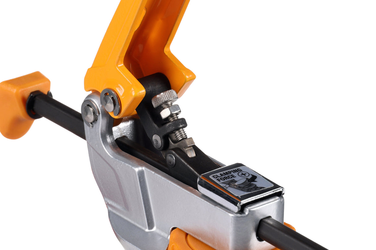 BORA Tool Dog Hole Auto Adjust Inline Toggle Clamp in use on workbench