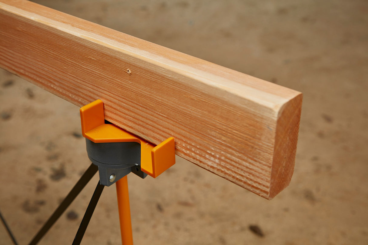 BORA X-Cup Supports in use with Centipede Work Stand showing 2x4in boards standing on edge and face down