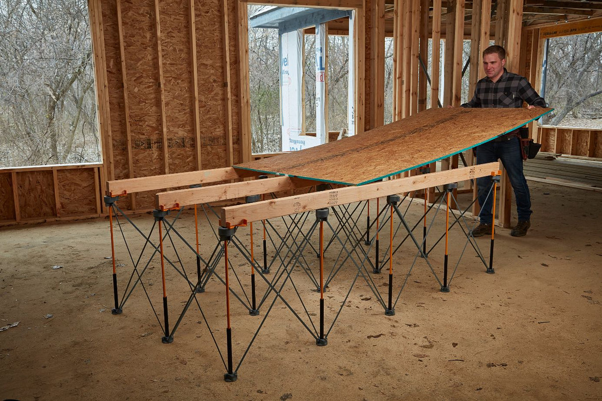 BORA Centipede Work Stand set up outdoors showcasing its portability and durability