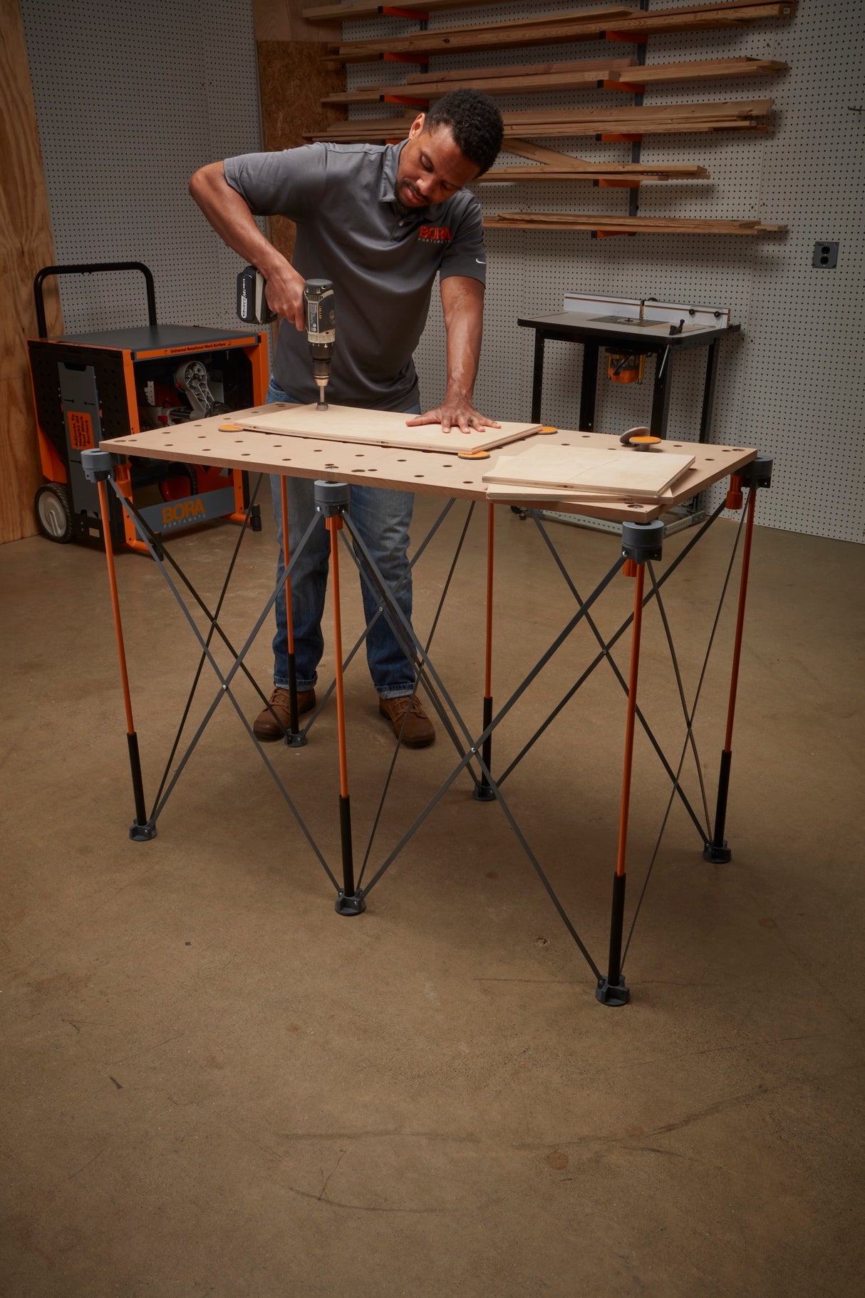 BORA Centipede CK6S Work Stand in action outdoors, showcasing its flexibility and portability