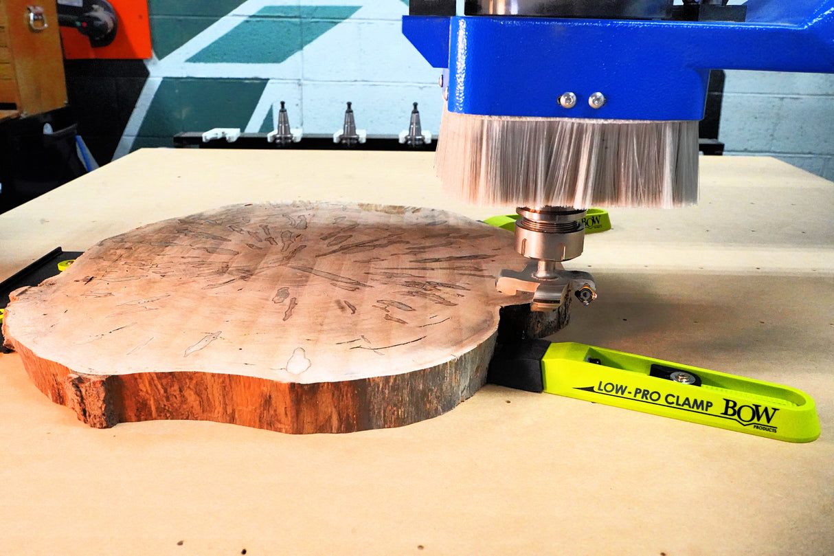 Bow Products Low Profile Clamping Kit in use on a CNC machine