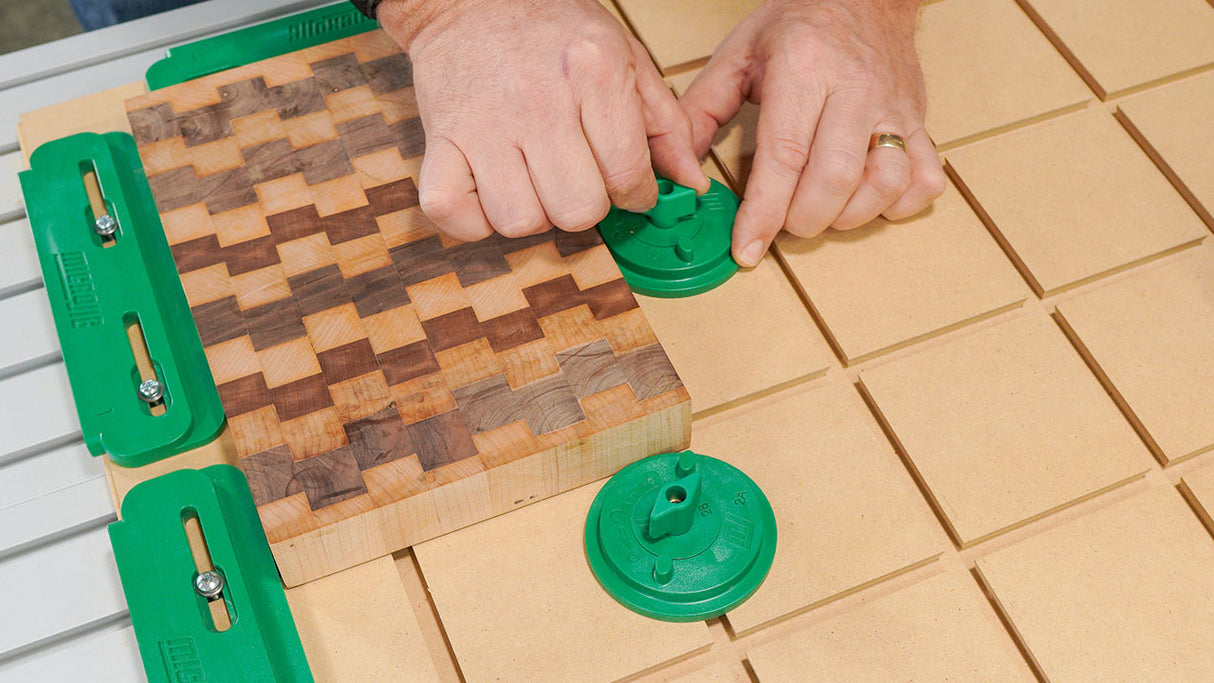 MicroJig MatchFit Ring Clamp Kit in use on dovetail track, enabling precise material positioning